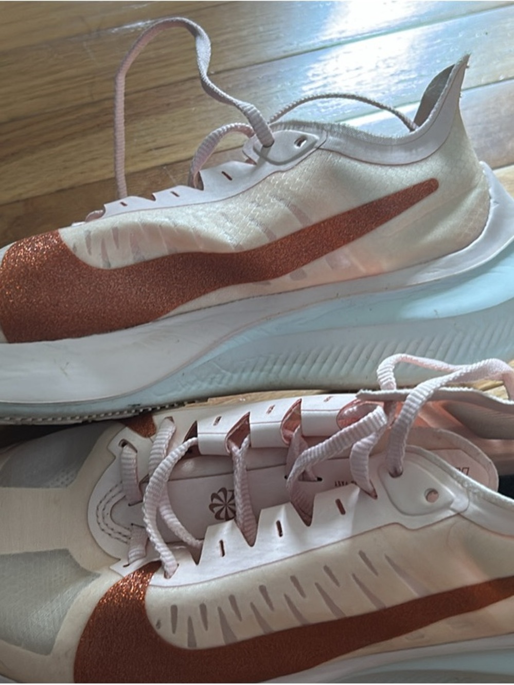 Nike White and Metallic Rose Running Sneakers